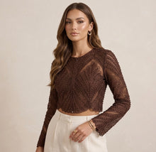 Blusa de manga larga con aplicaciones de brillo